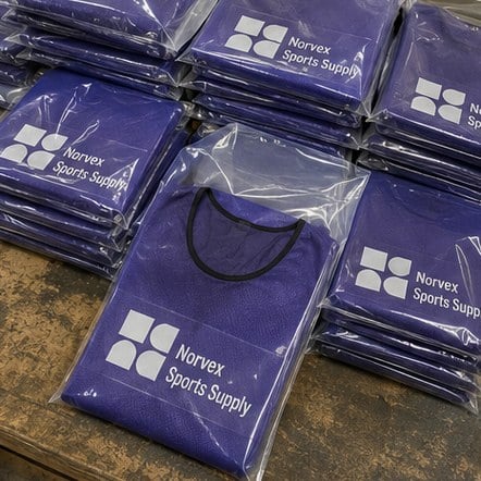 Customized pinnies for corporate sport days and events